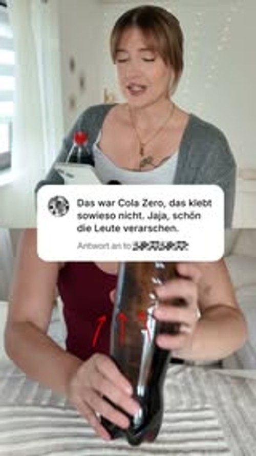1 Liter Cola, weißer Teppich