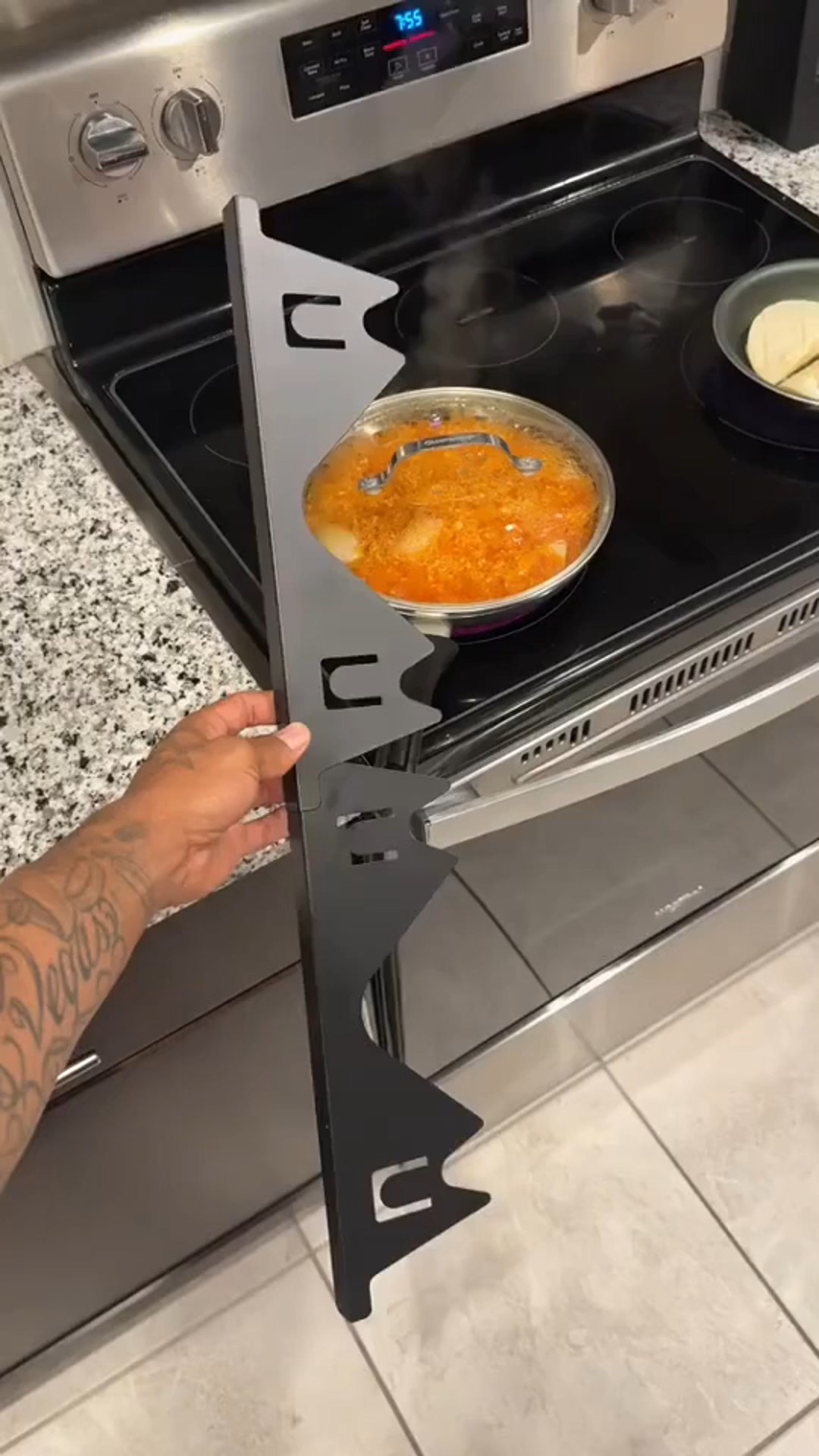 Stainless steel retractable cooktop gap filler panel, stove counter gap cover.