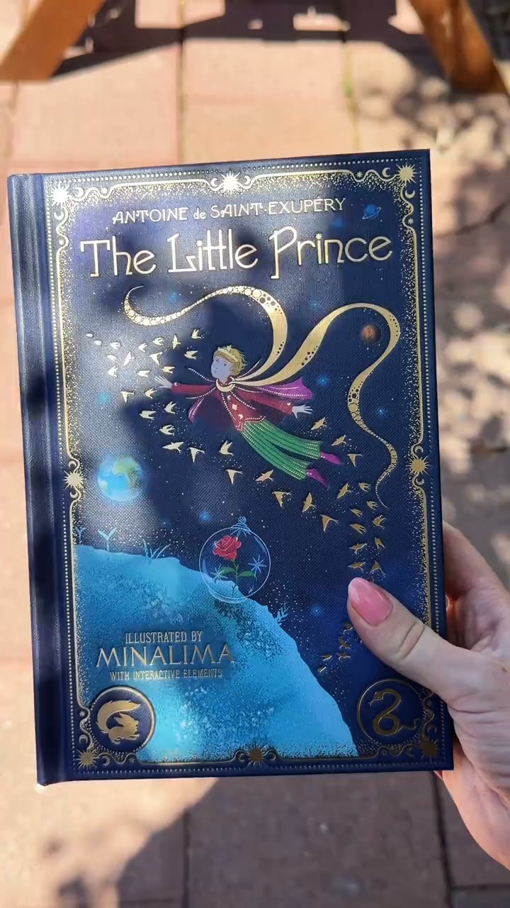 The Little Prince, with a rose whose petals turn and a fox that pops off the page.