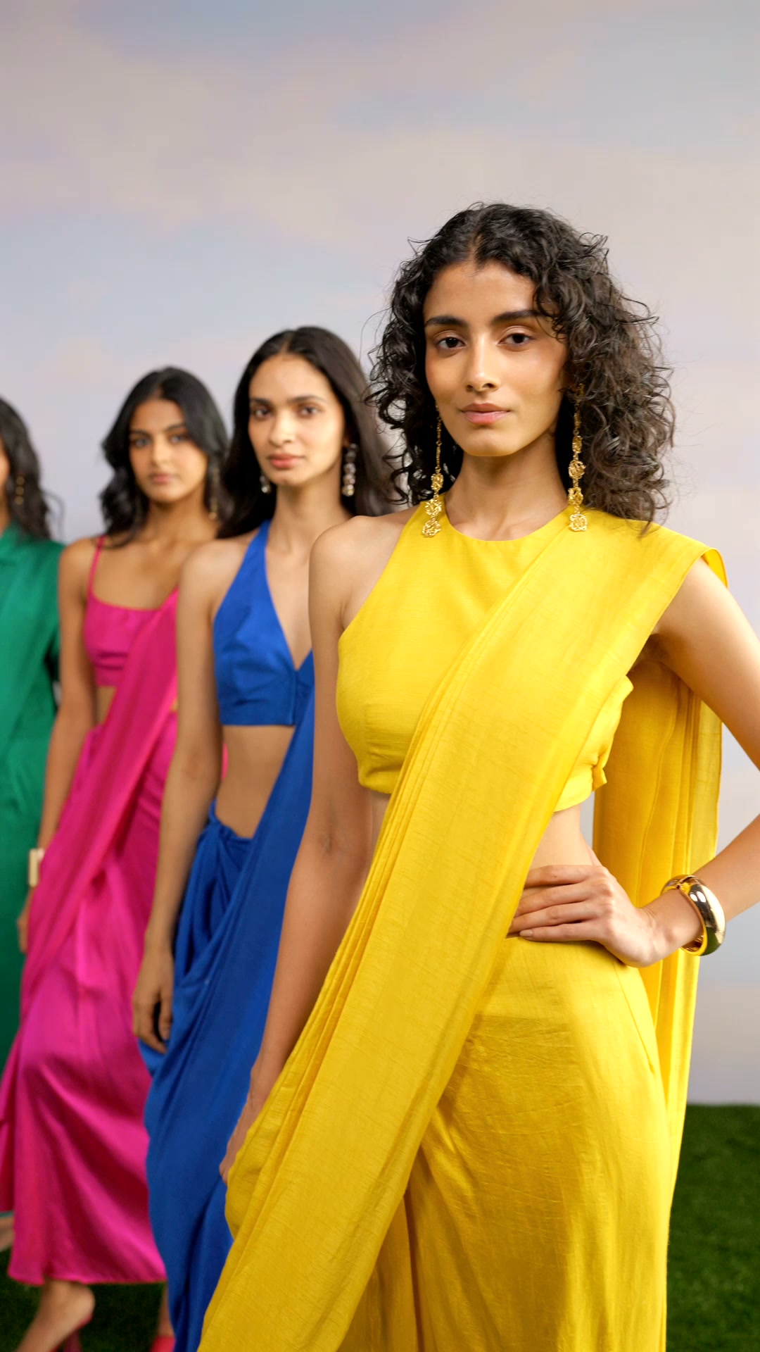 The season's most considered edit. Draped silhouettes, rich textures, and colour that commands the room.