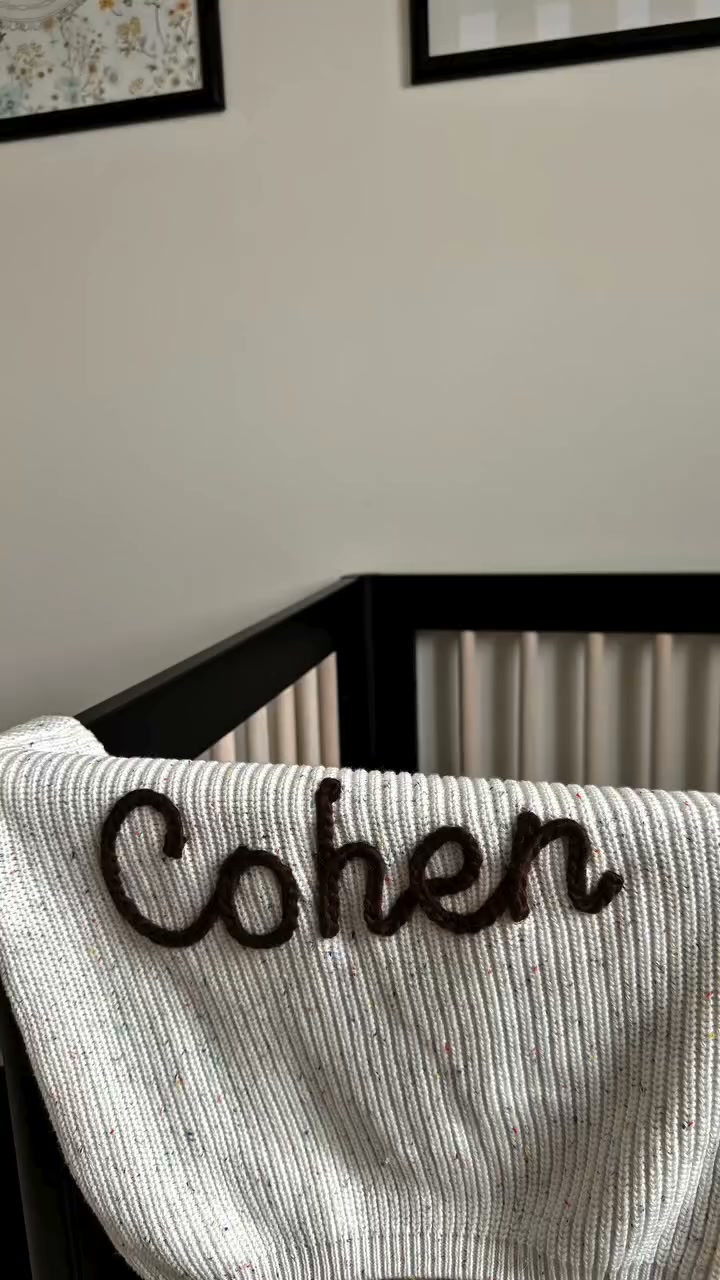 Their name. Knitted in.