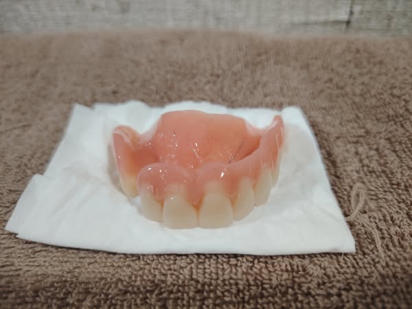 Read this if you wear dentures and use cream.