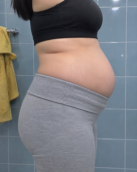 I look 6 months pregnant. She's 5.