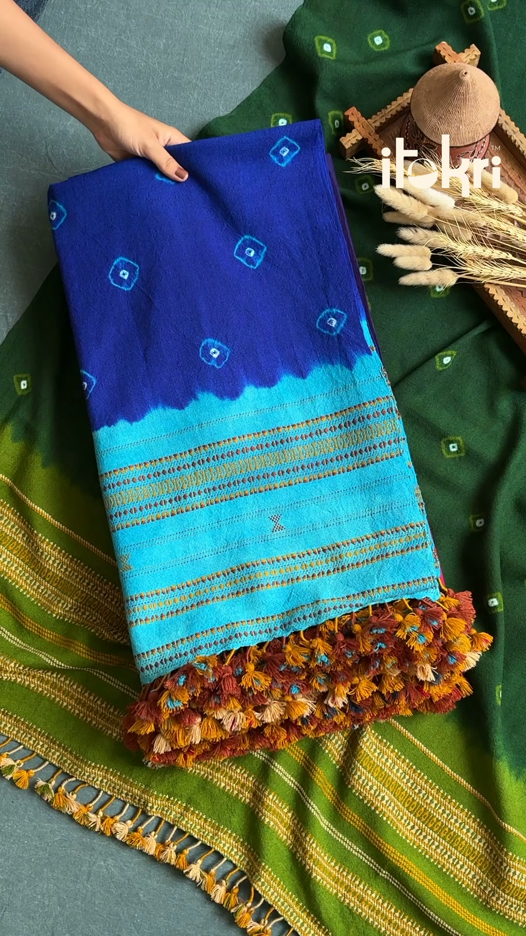 A Kutch bandhani shawl that arrives with the knots still tied. Shipped worldwide.