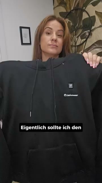 Beheizbarer Hoodie mit verstecktem Leuchtknopf