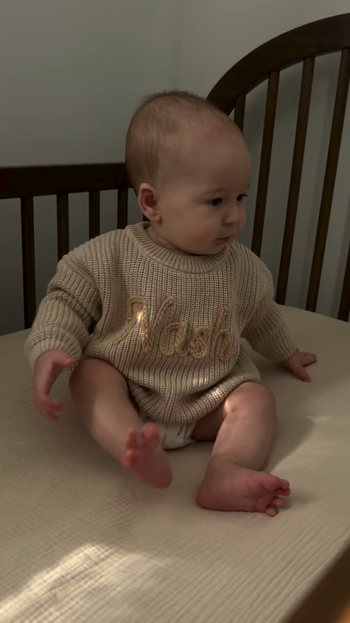 Their name. Knitted in.