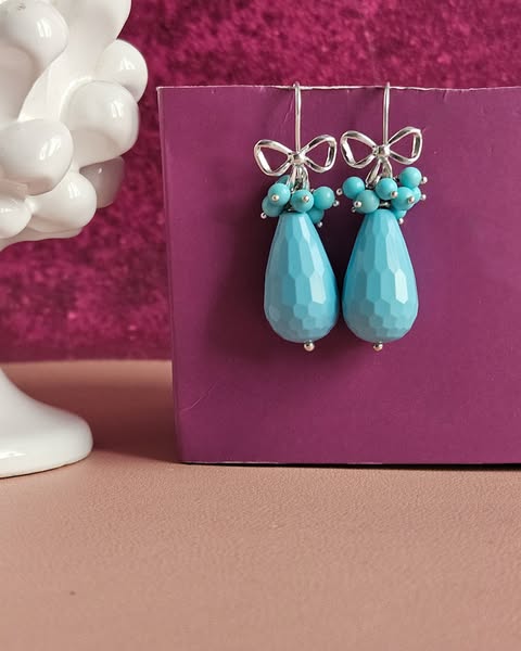 Turquoise Drop Earrings with Bows€50