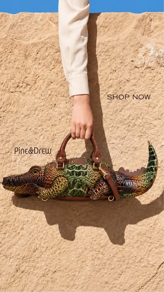 A Crocodile Handbag, Sculpted in Gold Detail