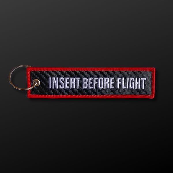 "Insert Before Flight" Carbon Fiber Style Keytag$12.99