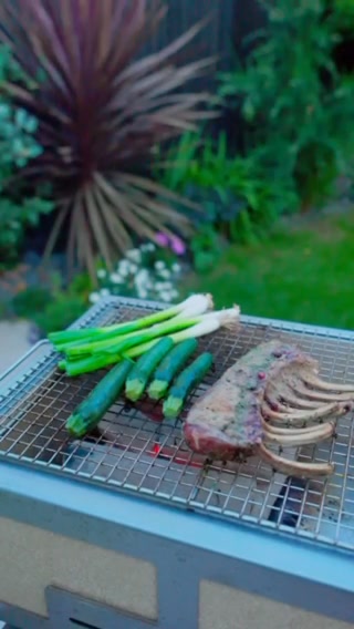 Herb-Marinated Lamb Rack with Charred Peas, Baby Courgettes, Spring Onion & Preserved Lemon Dressing