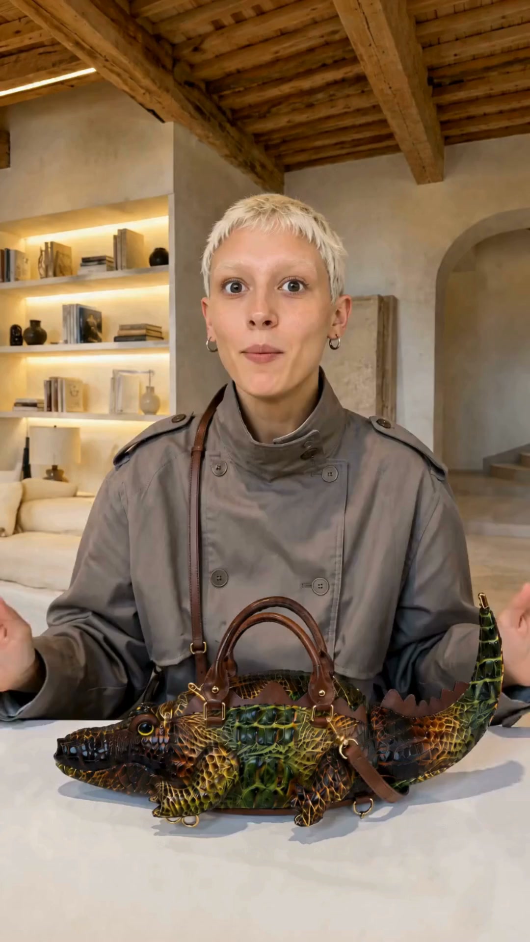 A Crocodile Handbag, Sculpted in Gold Detail