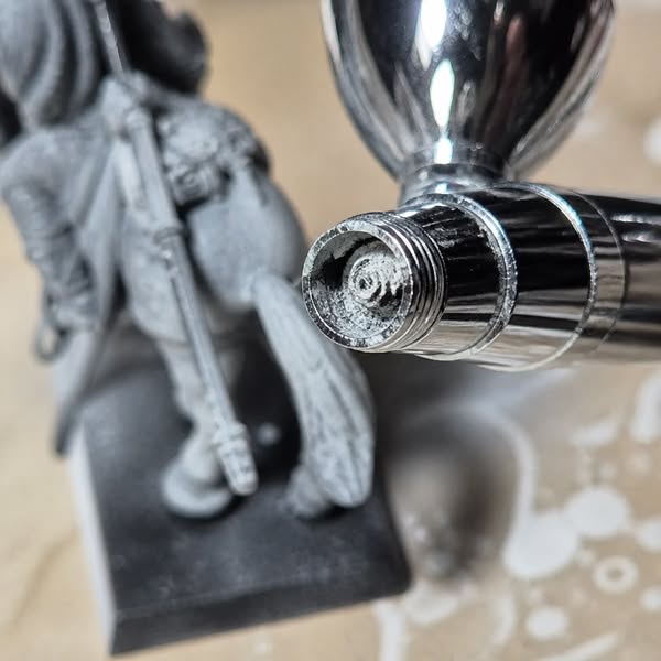 My airbrush has clogged forty times this year. Last week my roommate found out why in ten seconds.