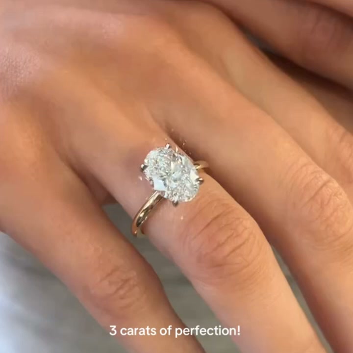 Classic Four-Prong Oval Moissanite Ring