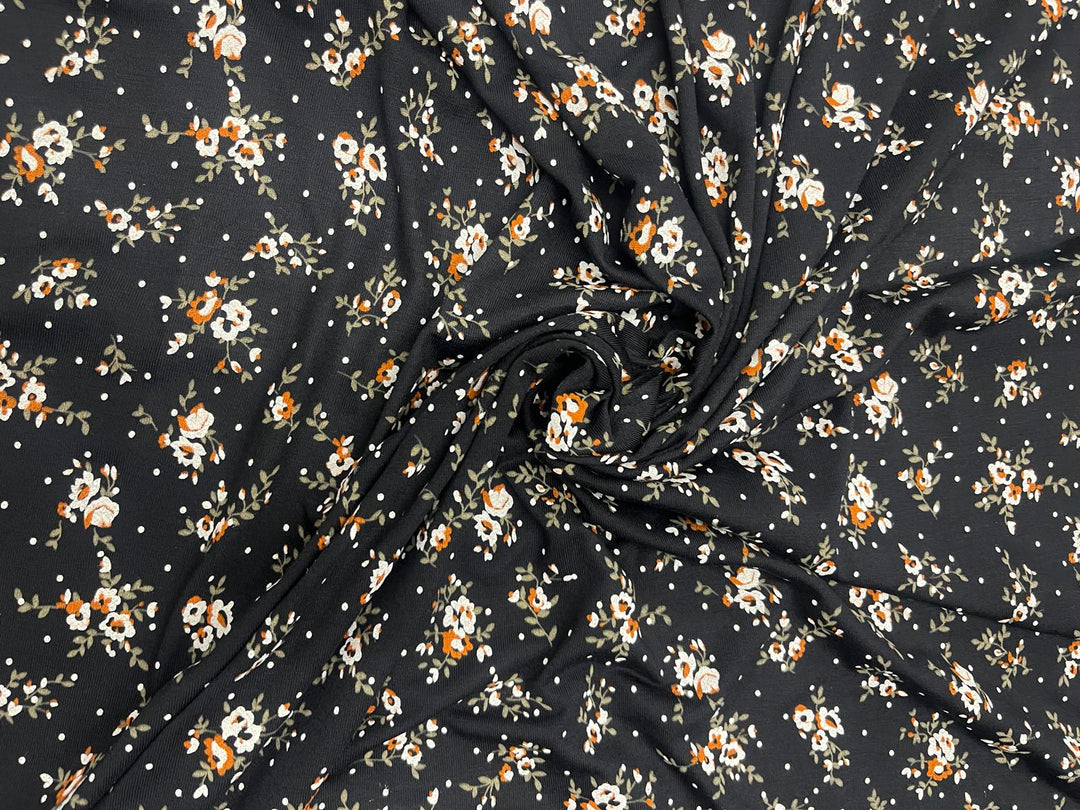 Black & Cream Ditsy Floral Viscose Jersey – £5.99/m