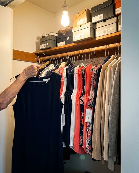 Seventeen sleeveless things in my closet and I can't wear one of them.