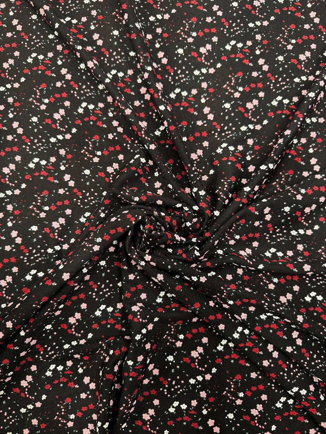 Black Ditsy Floral Viscose Jersey – £5.99/m