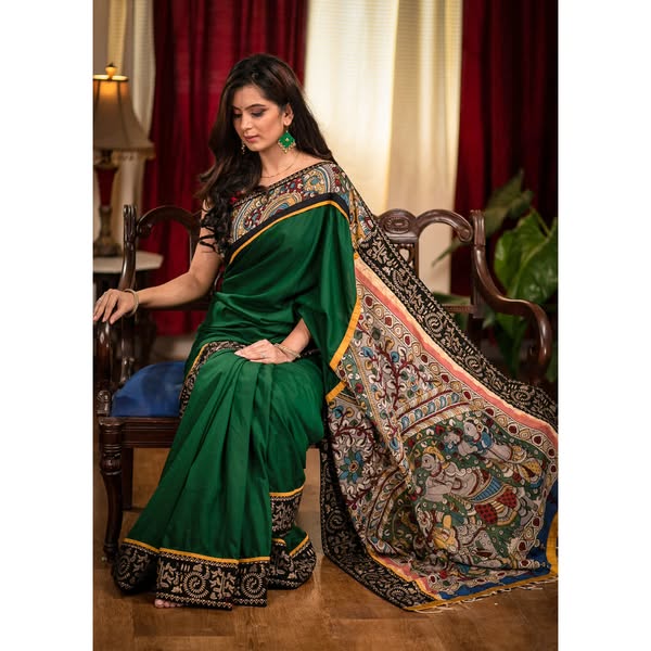 Forest green satin saree with hand painted kalamkari pallu