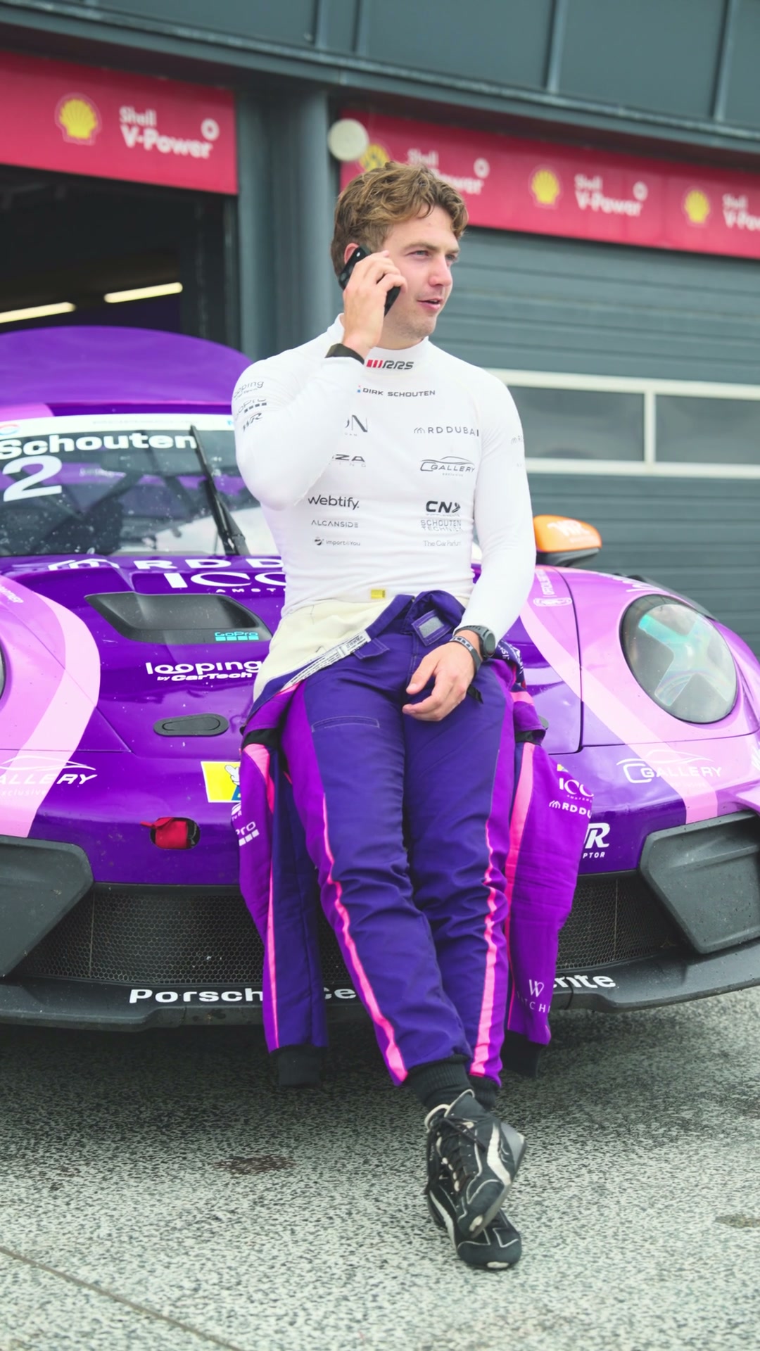 On his car. On his phone.