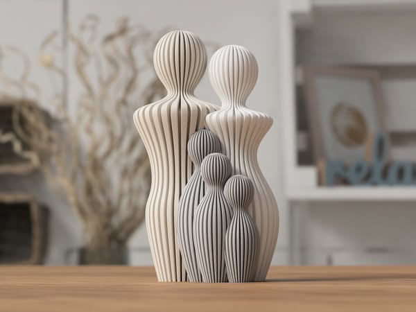 Familjeskulptur med 3 barn