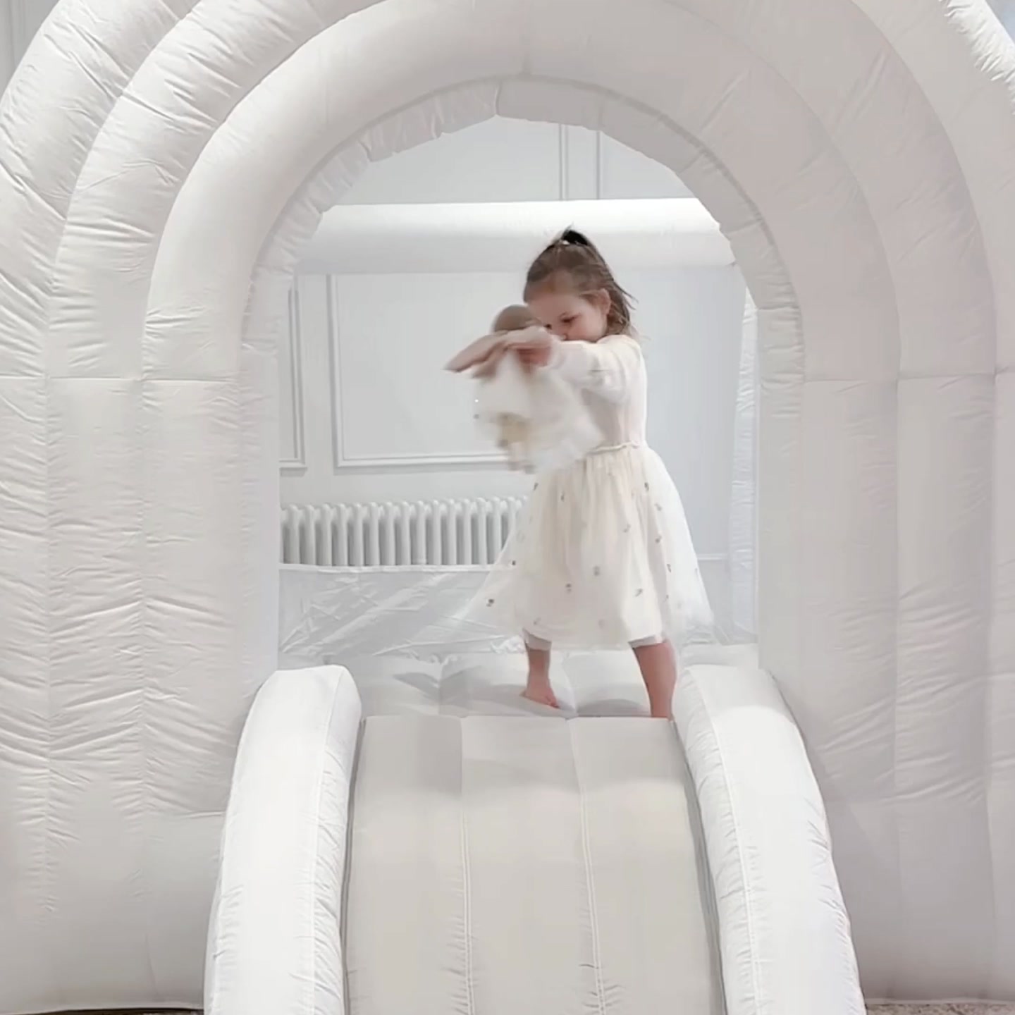 Rainbow Bounce House Fun