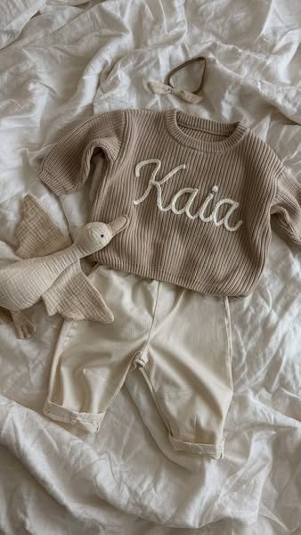 Their name. Knitted in.