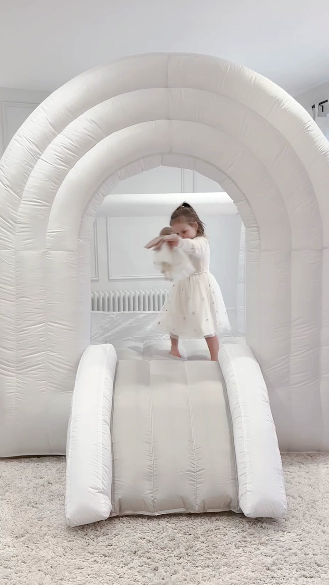 Rainbow Bounce House Fun