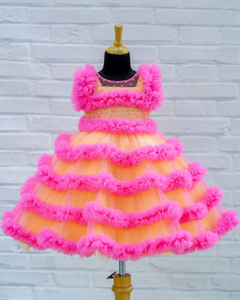 Simple yellow net gown with ditatchable pink frill net jacket gown