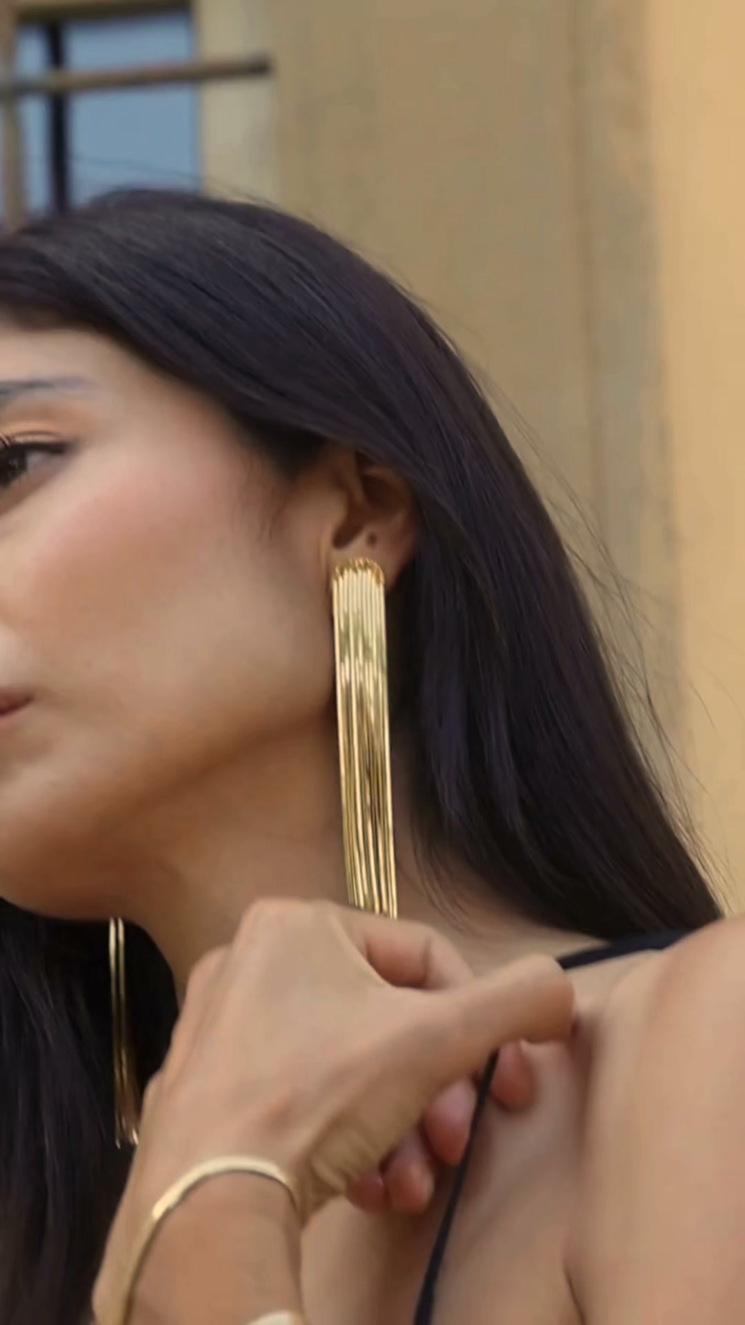 Frange in bronzo e bagno oro 18 kt.