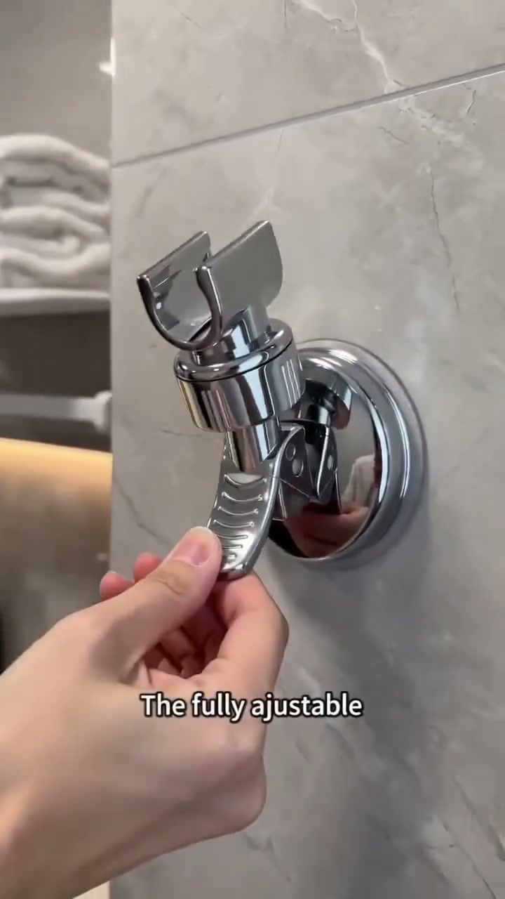Adjustable shower head holder
