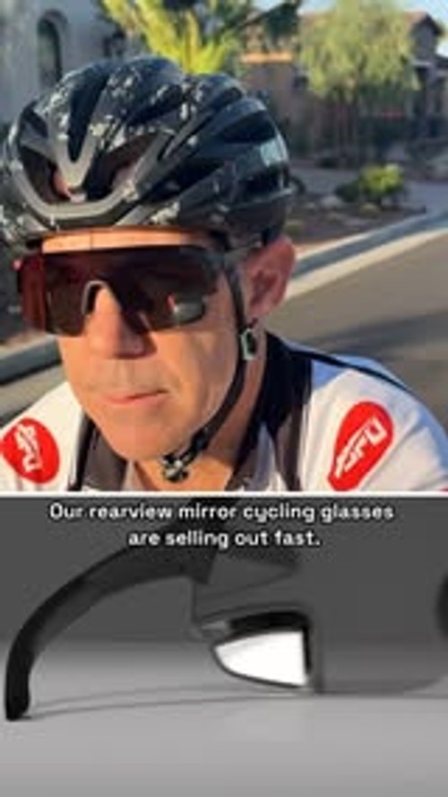 Eyewear with integrated rearview mirror