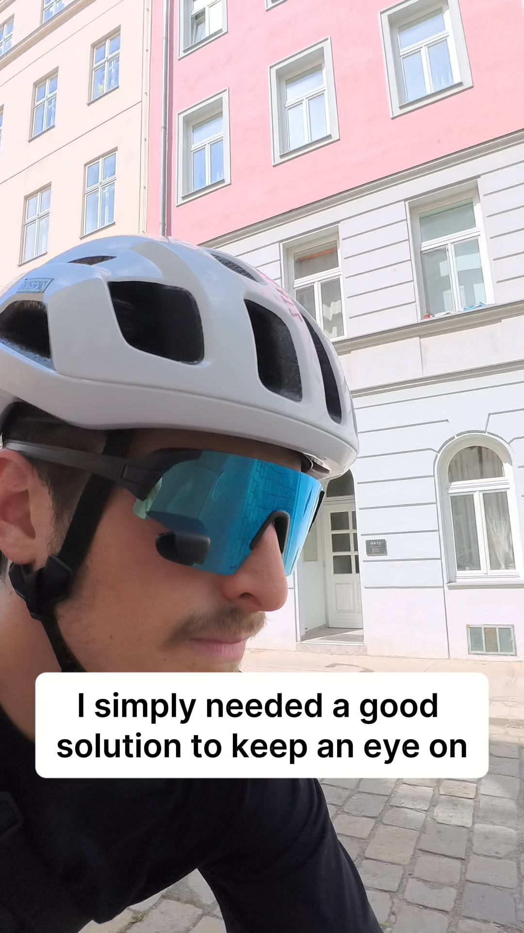 Eyewear with integrated rearview mirror