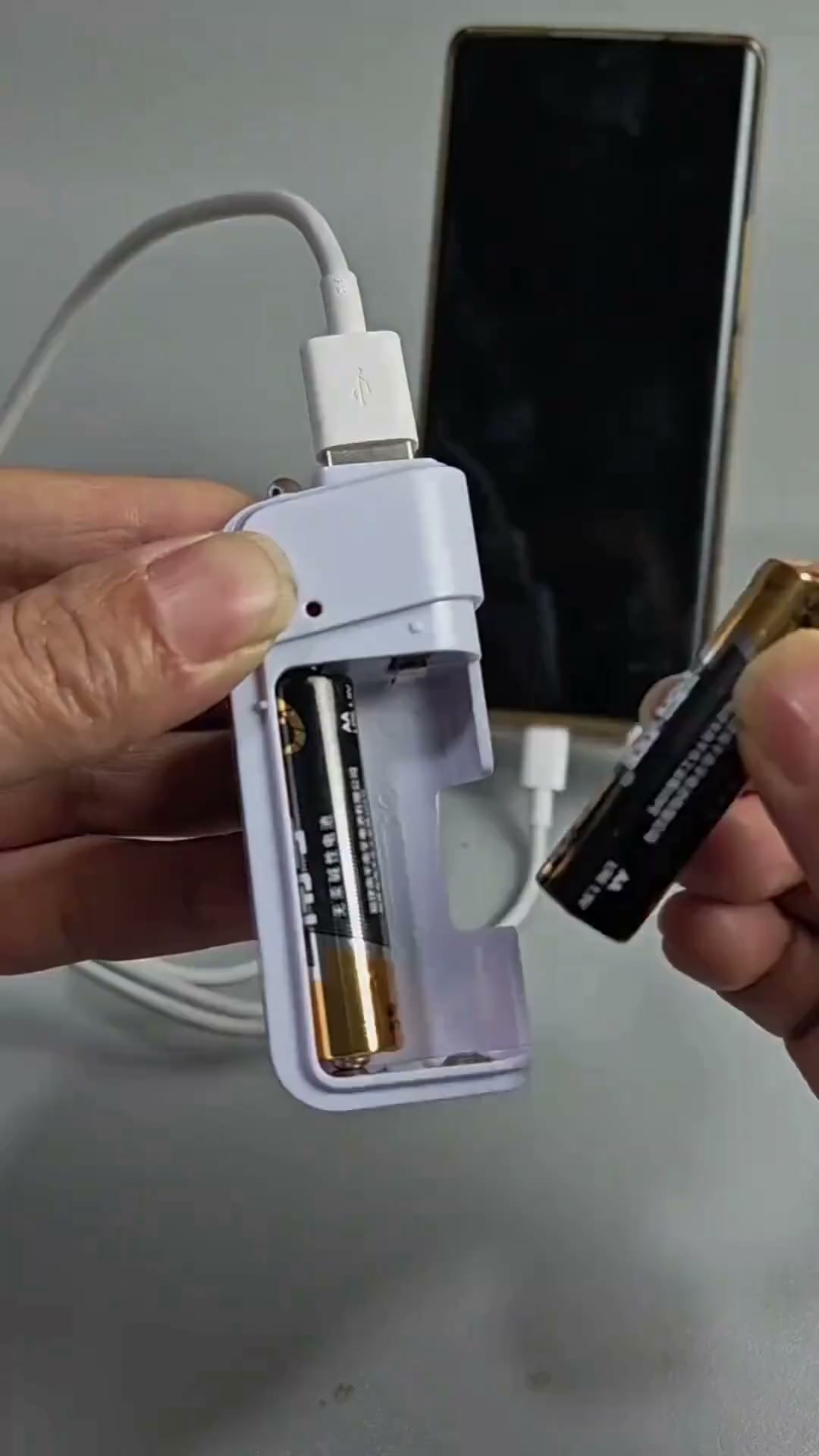 Portable Emergency Phone Charger‑AA Battery‑Powered Power Bank with LED Flashlight