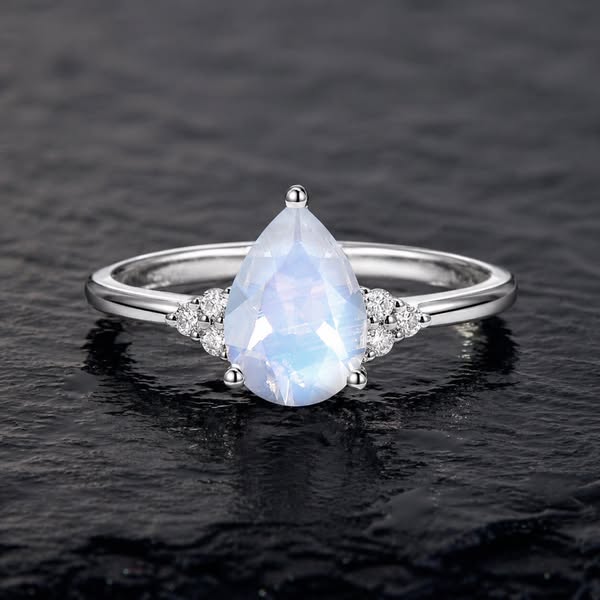 Luminous Aura Pear Cut Moonstone Six Stone Accented Engagement Ring