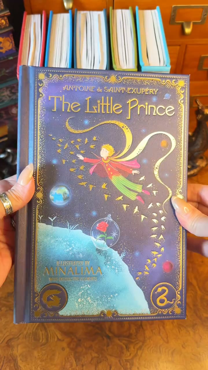 The Little Prince, with a rose whose petals turn and a fox that pops off the page.
