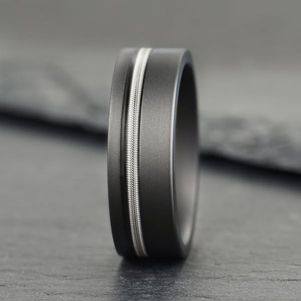 The Resonant – Gun Metal Titanium Ring With Guitar String (8mm)£200