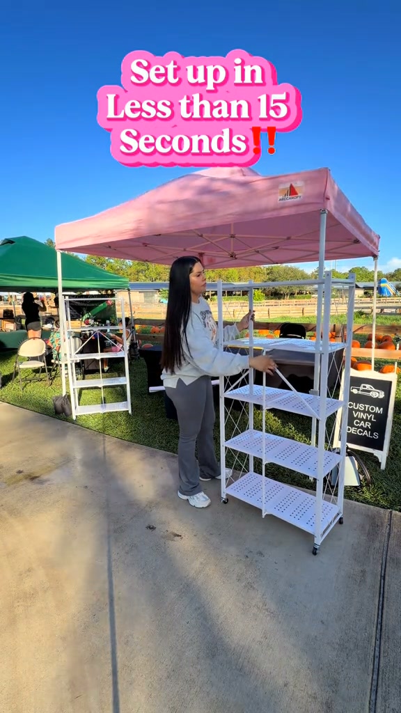 Foldable storage rack with locking casters, space-saving design, freestanding metal shelving unit.