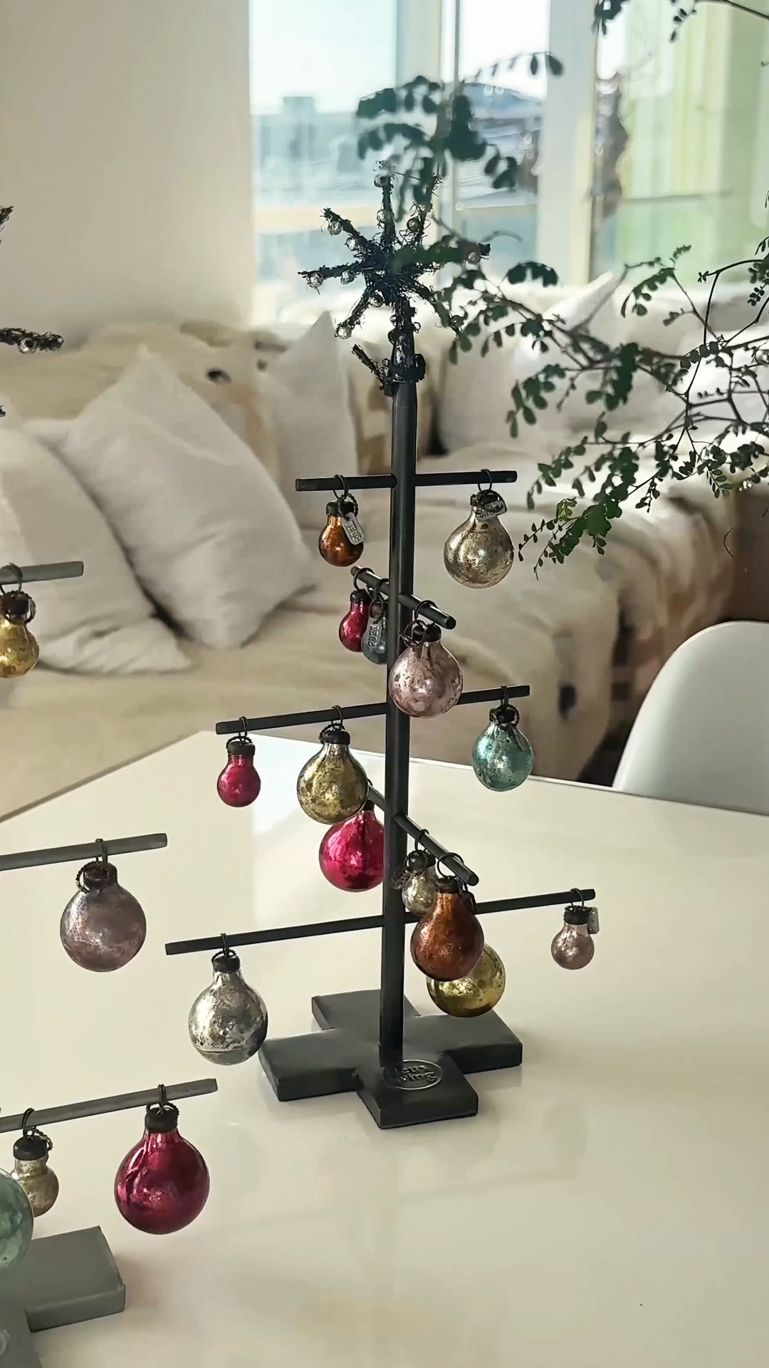 This light metal tree with mixed-color beads is designed for any festive setting. A beautiful representation of the Christmas season and v