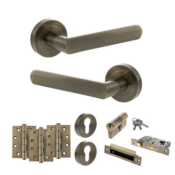 STATUS Carolina Door Handle Pack (Euro Lock Set - 2.5" CE Sashlock, 4" Fire Rated Hinges x3) - Antique Brass - ADPS42RAB22