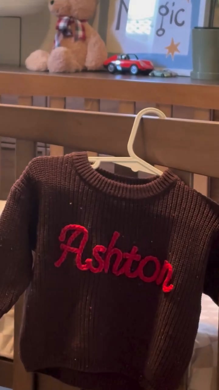 Their name. Knitted in.