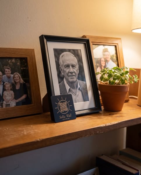 One small black tile holds my father telling his stories.