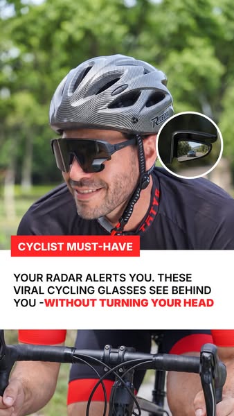 Eyewear with integrated rearview mirror