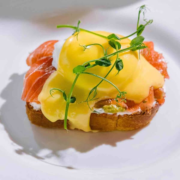 Hollandaise Sauce A rich, creamy, buttery sauce with a refreshing lemony tang. Simply pour over poached salmon or asparagus. This is the qui