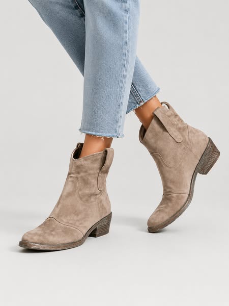 My mother always said every woman deserves one pair of boots that take her anywhere