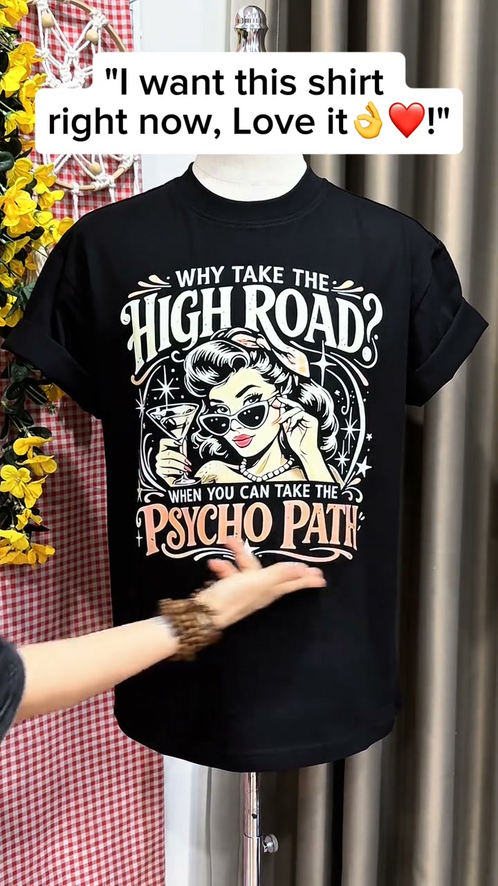 Fun, fearless, and full of retro attitude. Women's Vintage Retro Pin-Up Girl Graphic Tee