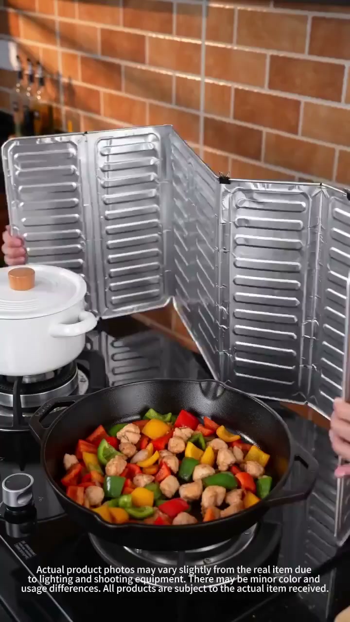 DON'T MISS 50% OFF! Stop oil splatter before it hits your walls — this foldable shield catches grease, wipes clean in seconds, and stor