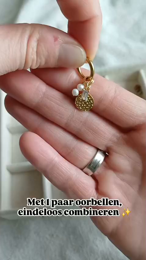 Eén paar oorbellen. Eindeloos variëren.