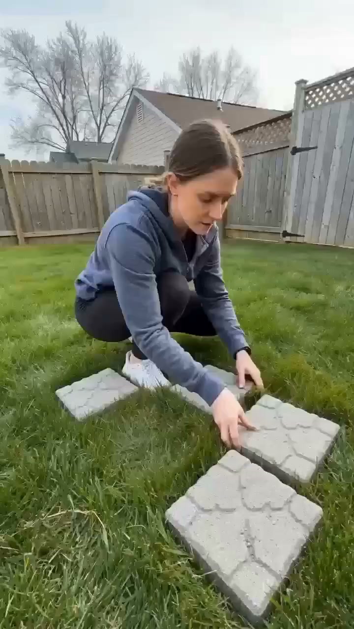 Saai, grijs betonnen pad dat geen persoonlijkheid heeft? Verander beton in een tuin vol zonneschijn met deze herbruikbare zonnebloemmal –