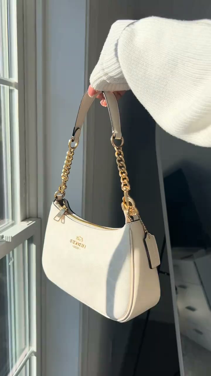 She's already in love with her new bag!