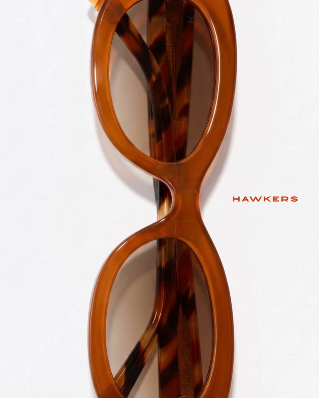 DESIGNED IN SPAIN · SHIPPED WORLDWIDE | HAWKERS™