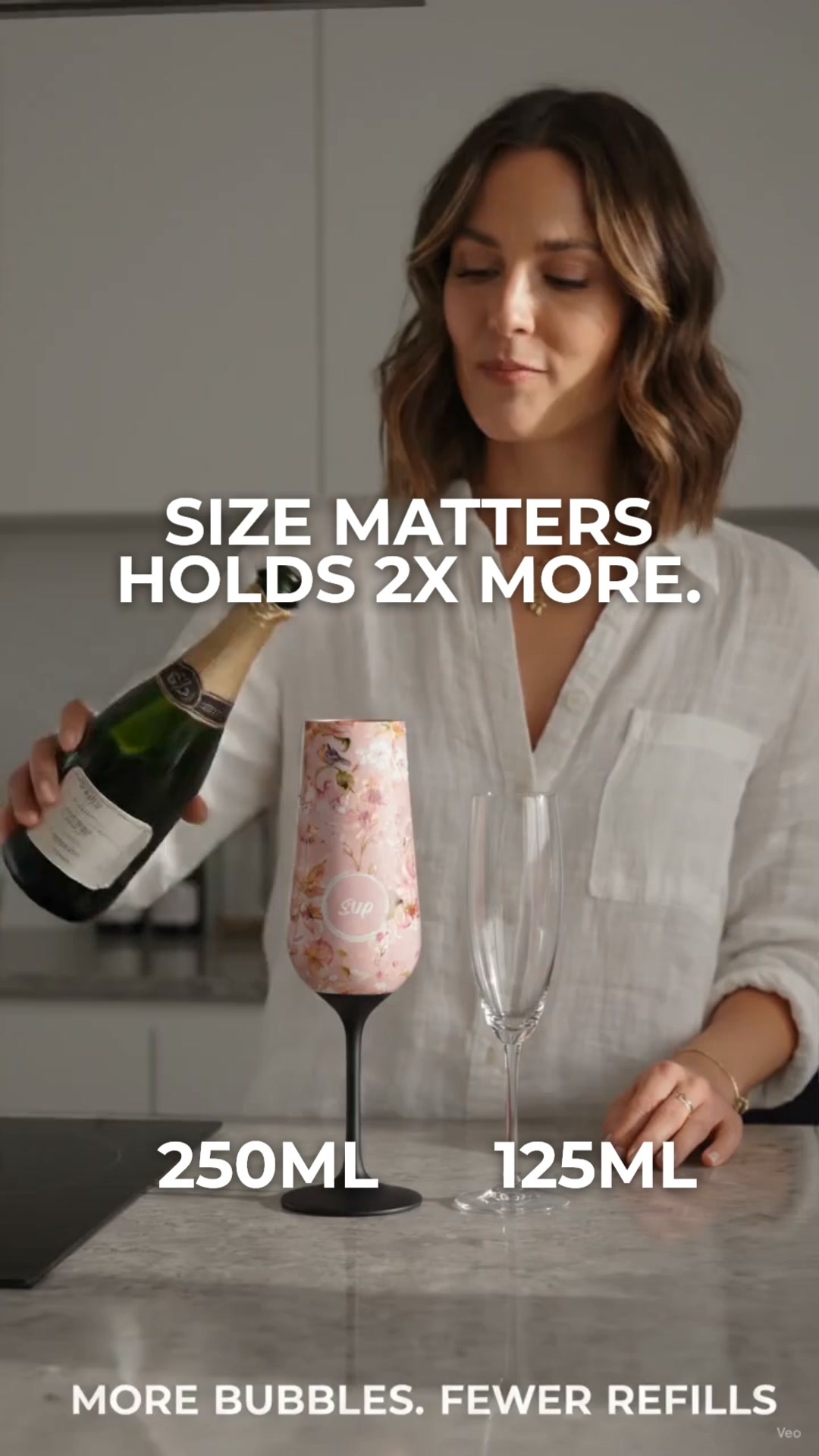 Holds 250ml. Glass holds 125ml.